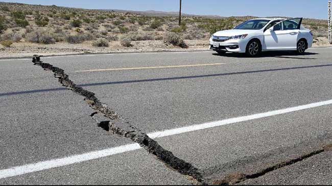  A crack in the road is seen near Ridgecrest, California after Thursday's quake